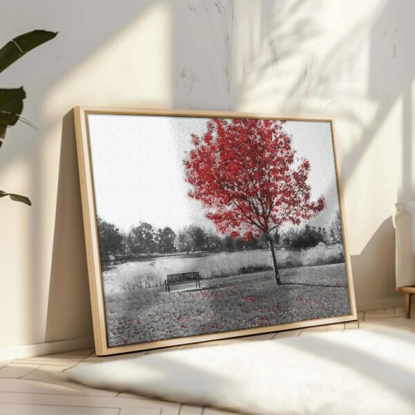 Empty park bench under red tree in black and white Printed On Canvas